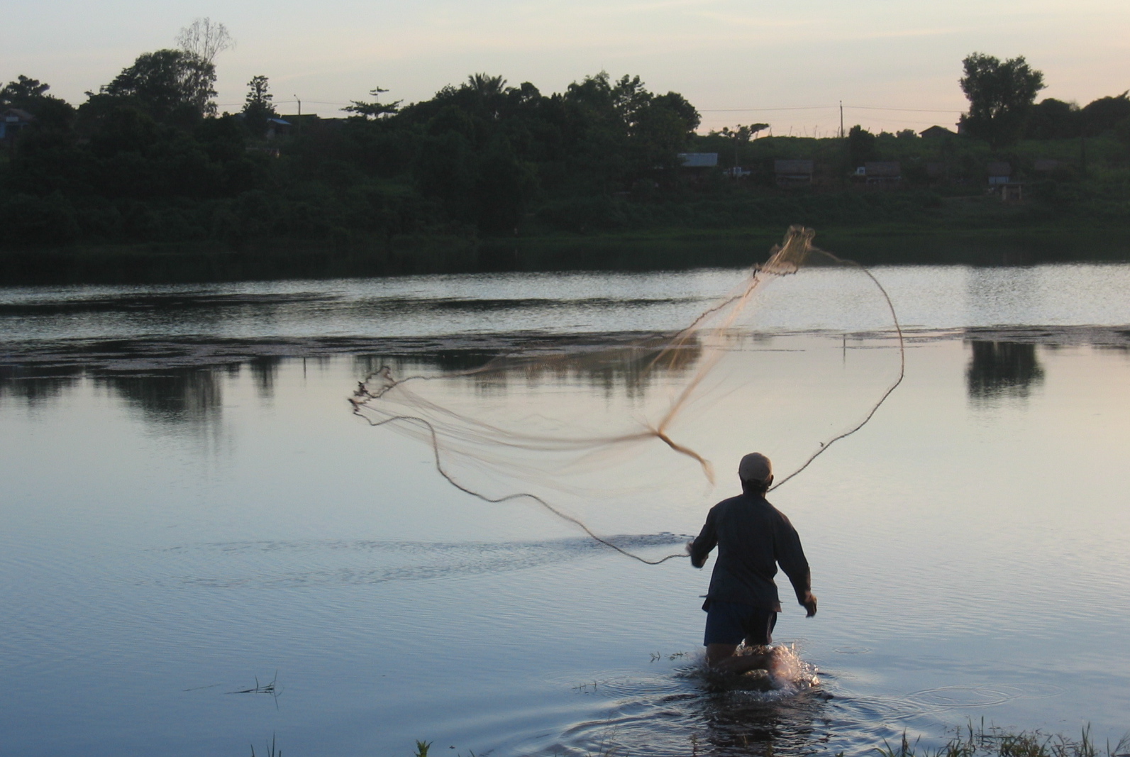 Catching fish for supper in Bung Kansaing