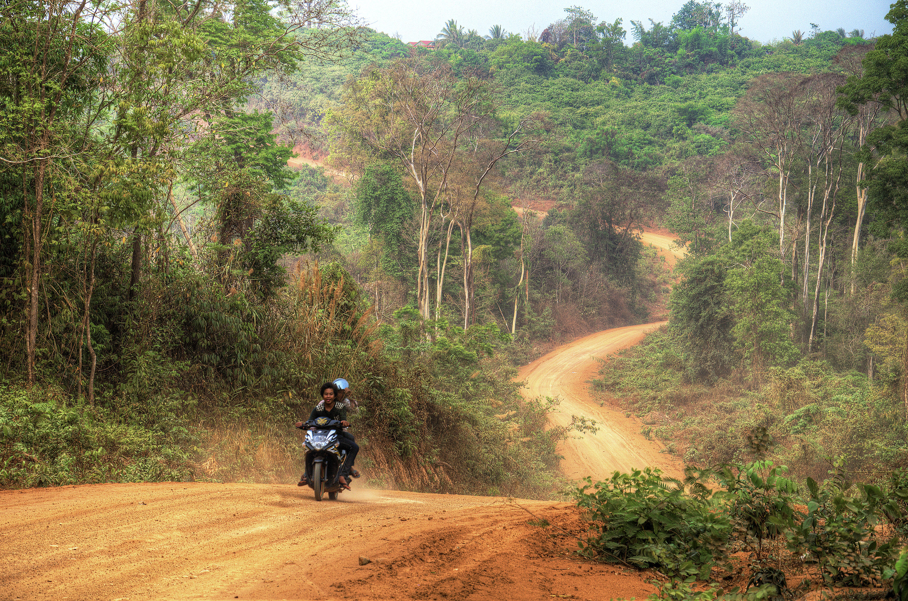 Dry Season red dust on a road in Northeast Cambodia