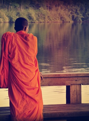 buddhist monk in cambodia, looking at the view