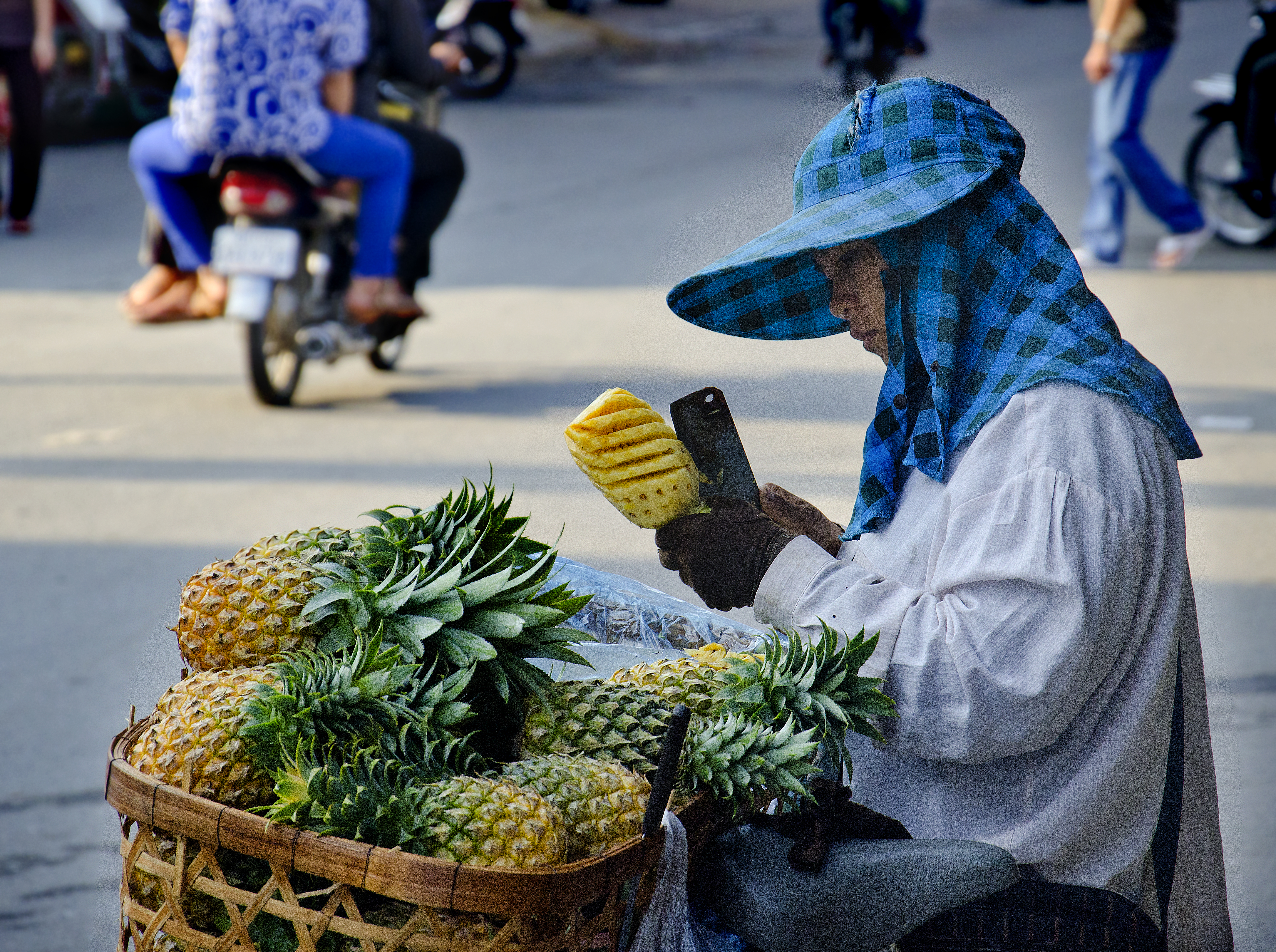 Carving a pineapple, Cambodia style